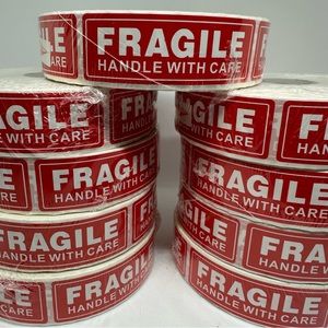 Fragile Handle With Care red stickers for shipping, packaging, moving.